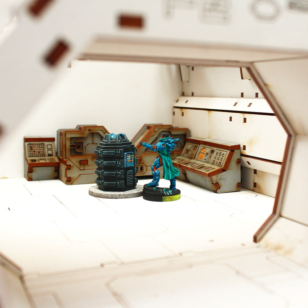sci fi diorama with computer consoles and hacker at a server